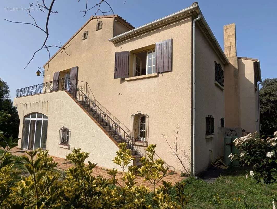 Maison à SAINT-HILAIRE-D'OZILHAN