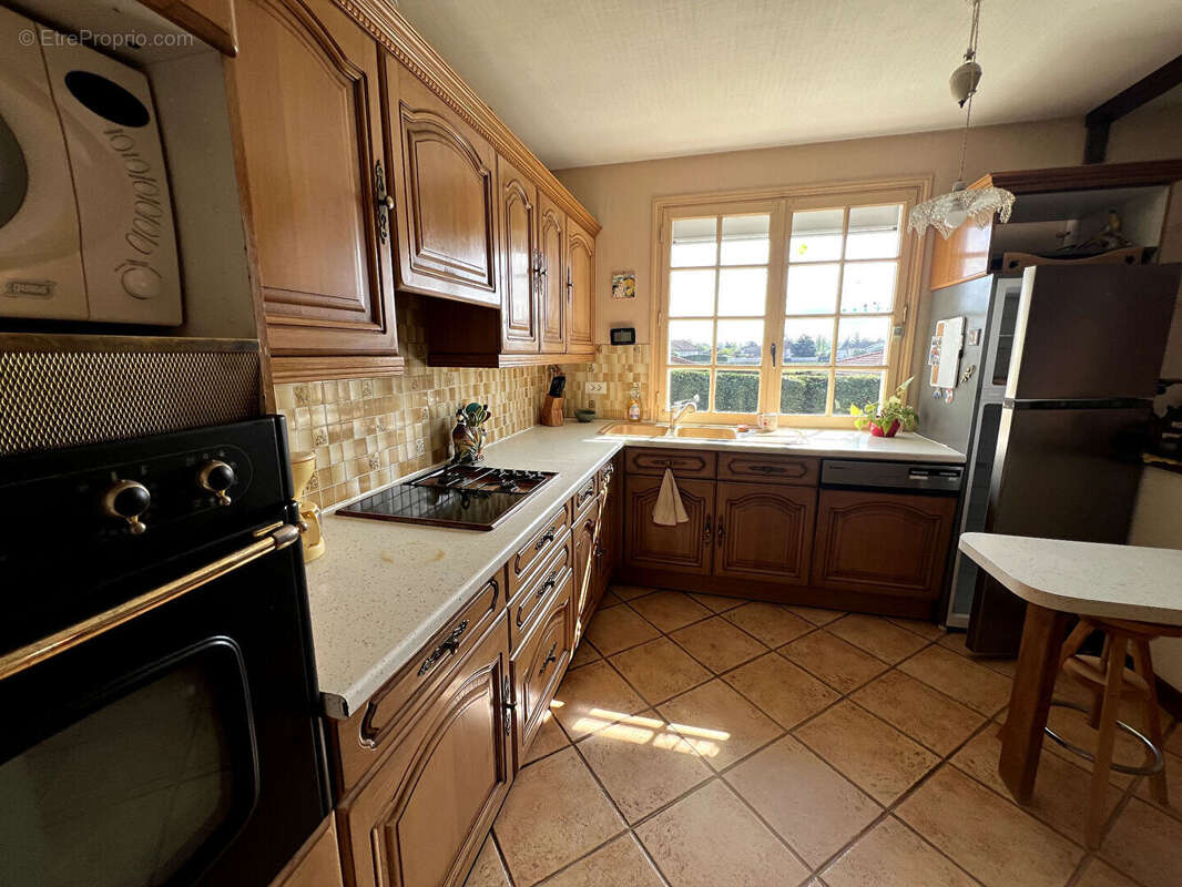 Maison à COMMELLE-VERNAY