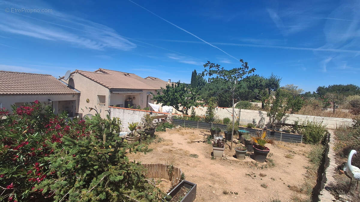 Maison type 4 mitoyenne avec jardin ,garage et 1 place de parking privative - photo 10