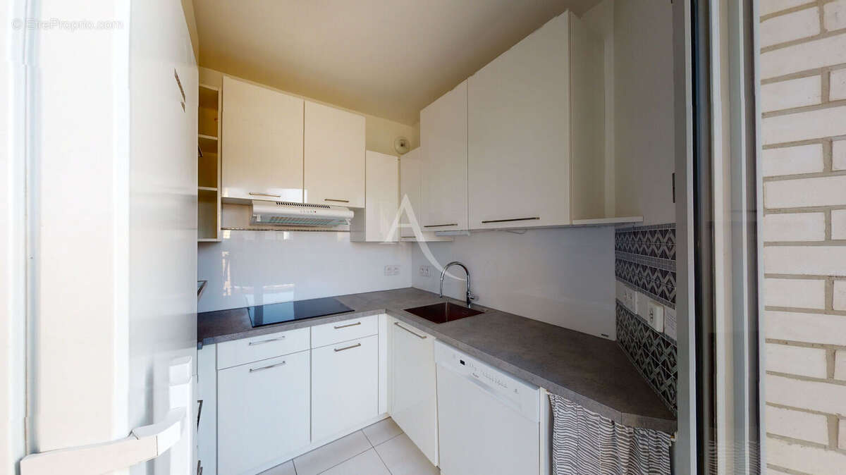 Appartement Asnières Sur Seine 3 pièces 63.44 m2 avec terrasse, cave et parking. - photo 5