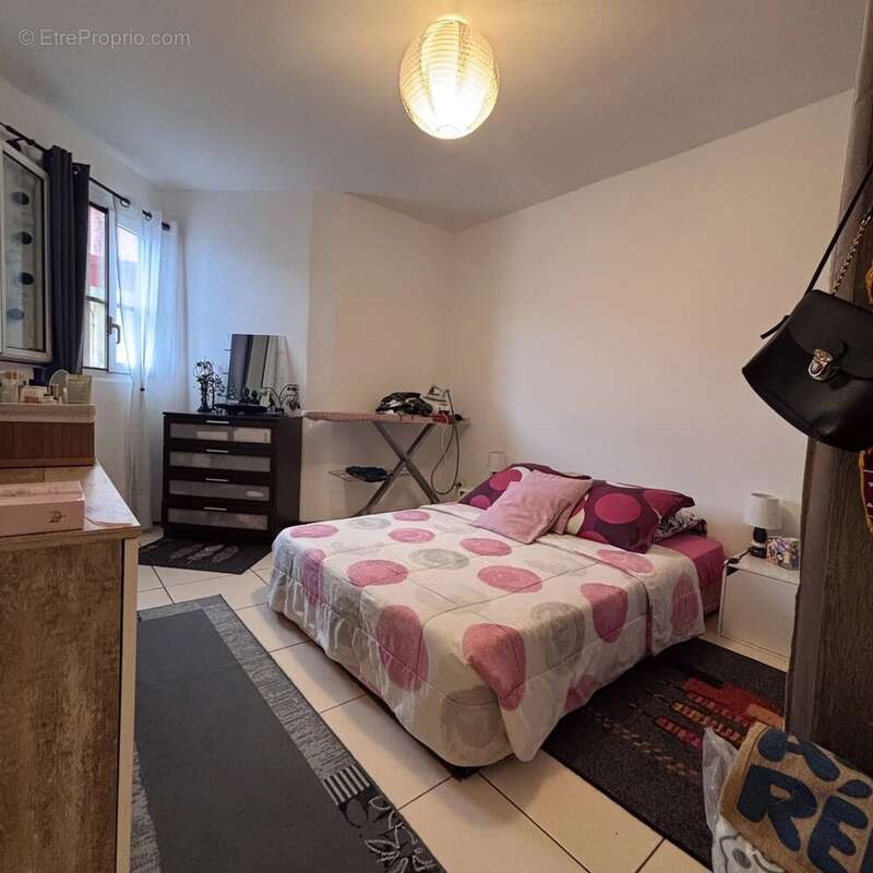 Appartement t3 montgaillard – saint-denis 97400 - photo 6