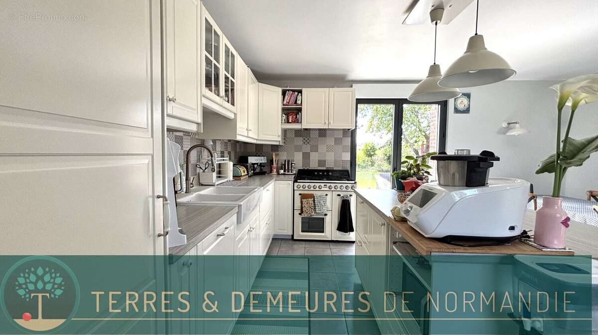 Maison à LE MESNIL-REAUME