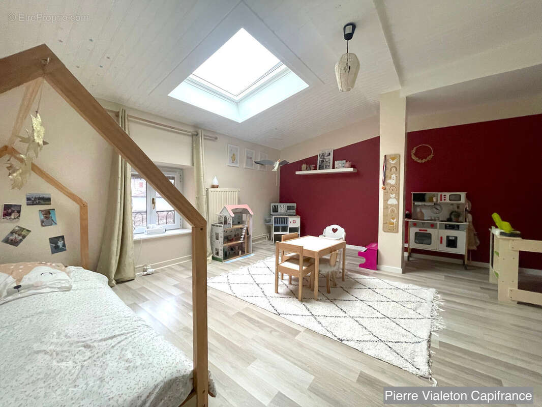 SAINT-CHAMOND- duplex familial lumineux - 103,43m2 loi Carrez (109,70m2 au sol )- 3 chambres -balcon - photo 4