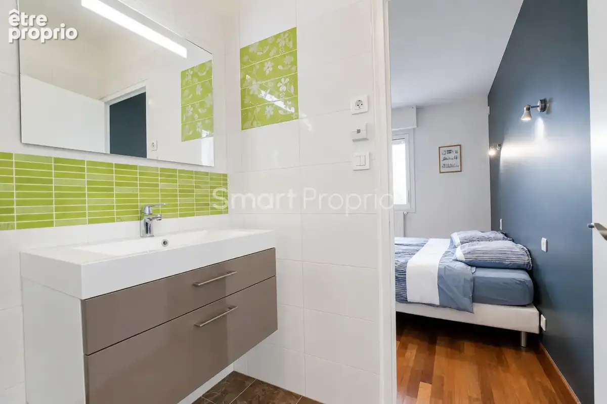 Crevin — Maison 160 m2, 5 chambres, cinéma et double garage - photo 14