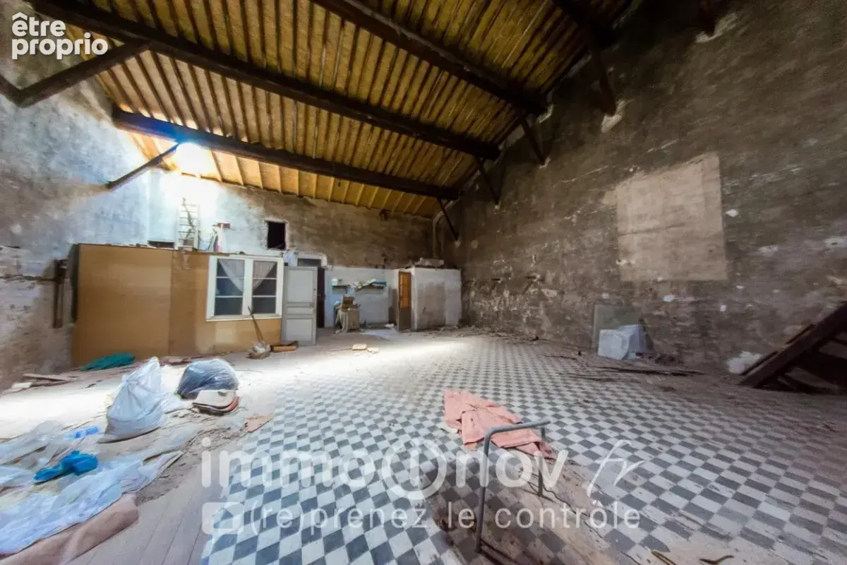 EXCLUSIVITE - Ensemble immobilier à rénover avec maison, appartement et garage - photo 13