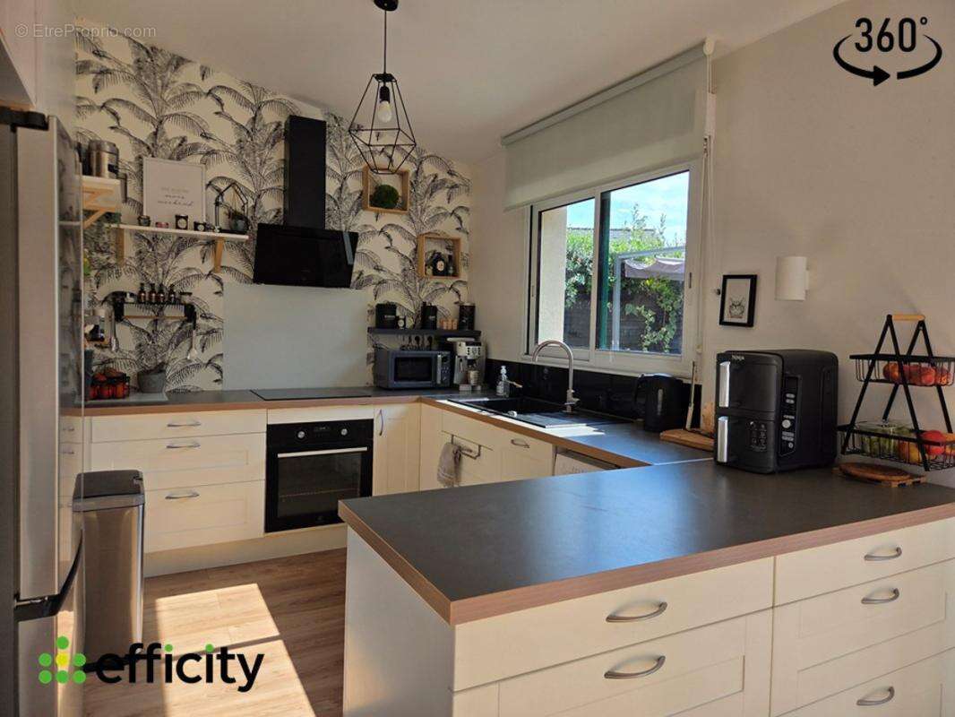 Maison 115 m² à La Chapelle-Des-Fougeretz  - photo 4