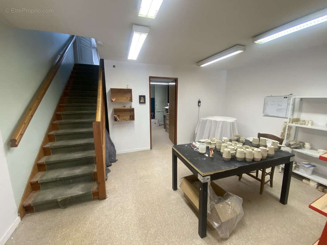 Immeuble de ville avec partie commerciale et partie habitation avec terrasse - photo 20