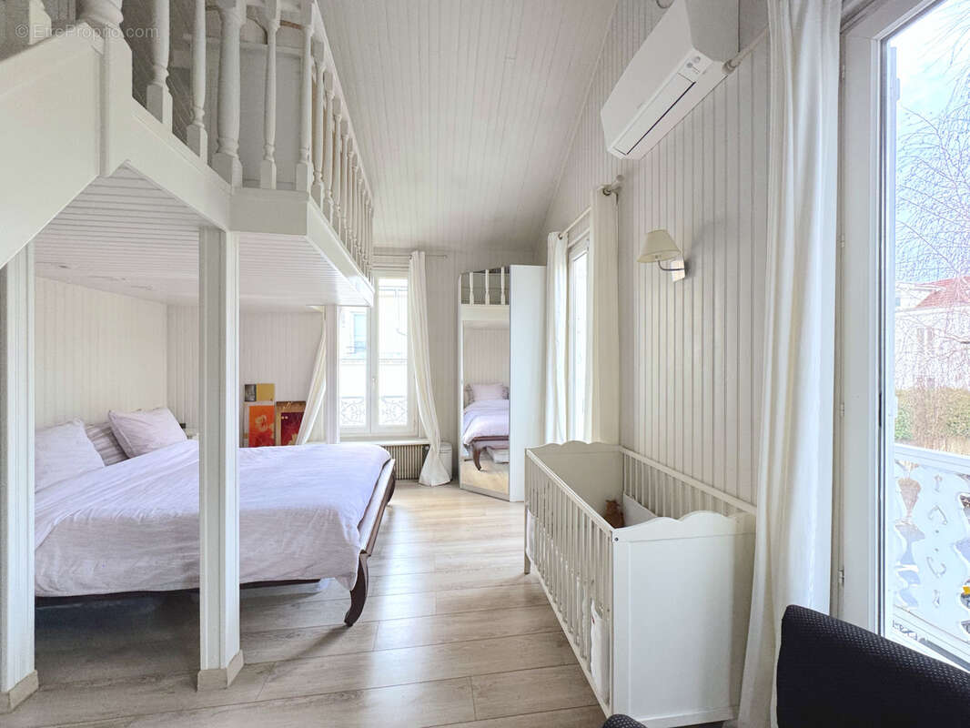 Maison à COURBEVOIE