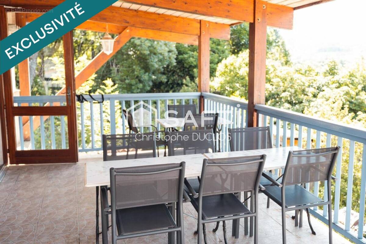 Photo 1 - Commerce à SAINT-GENIEZ