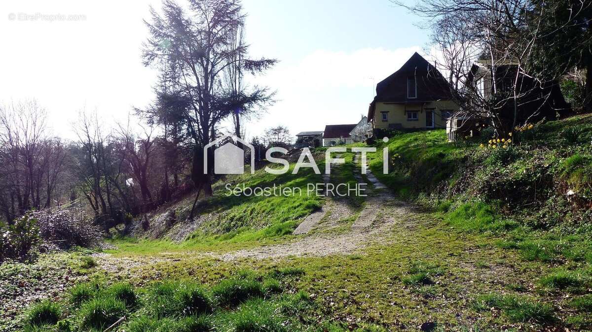 Photo 3 - Maison à SAINT-OUEN-DE-THOUBERVILLE