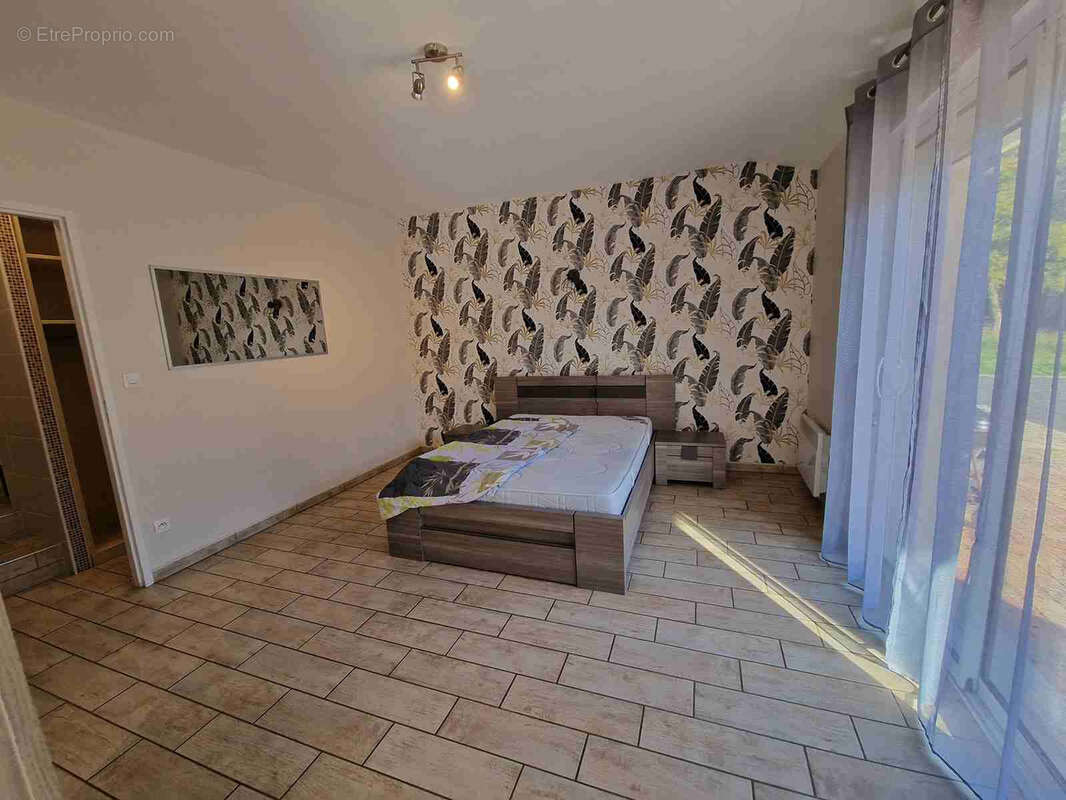 Maison de plain-pied avec 2 logements avec garages - photo 10