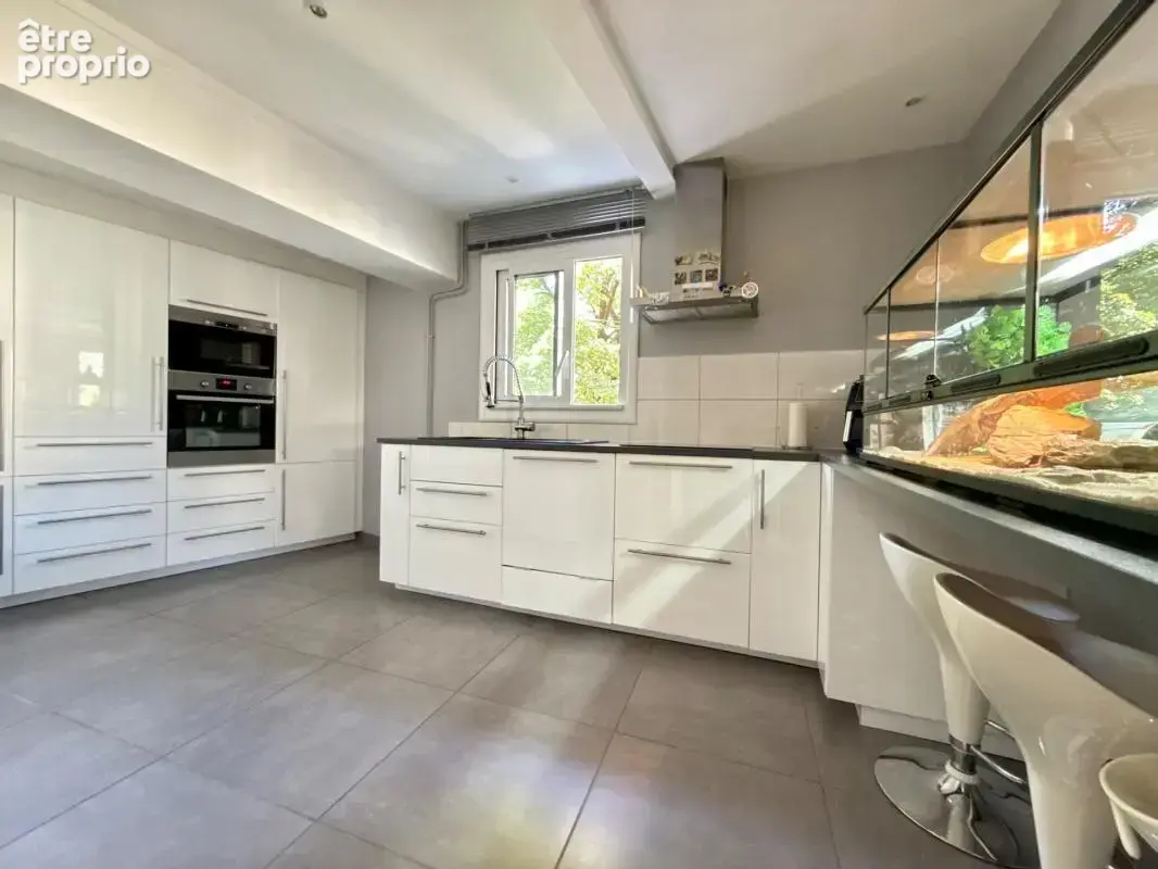 Maison de ville 84,06 m2 avec garage - Firminy centre / place Marquise - photo 2