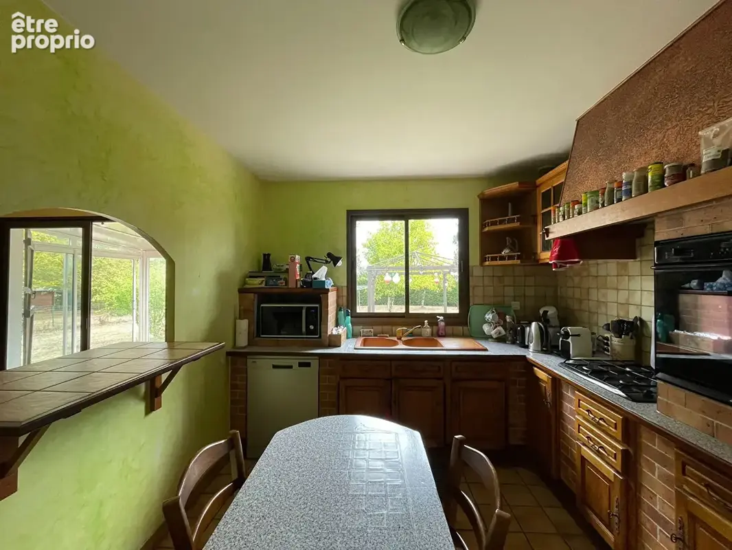 LOUPES - Maison de 108m² de plain-pied avec piscine, garage et terrain d'environ 2 100m² - photo 6