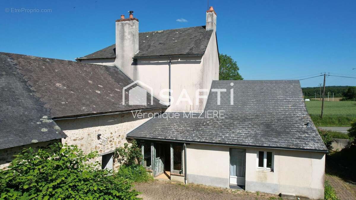 Photo 2 - Maison à NEUVILLETTE-EN-CHARNIE