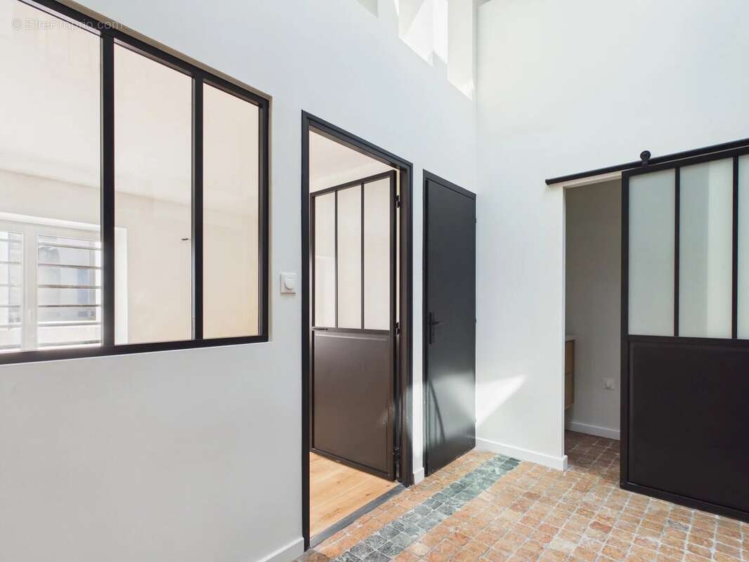 Duplex au charme historique de 102 m² - photo 14