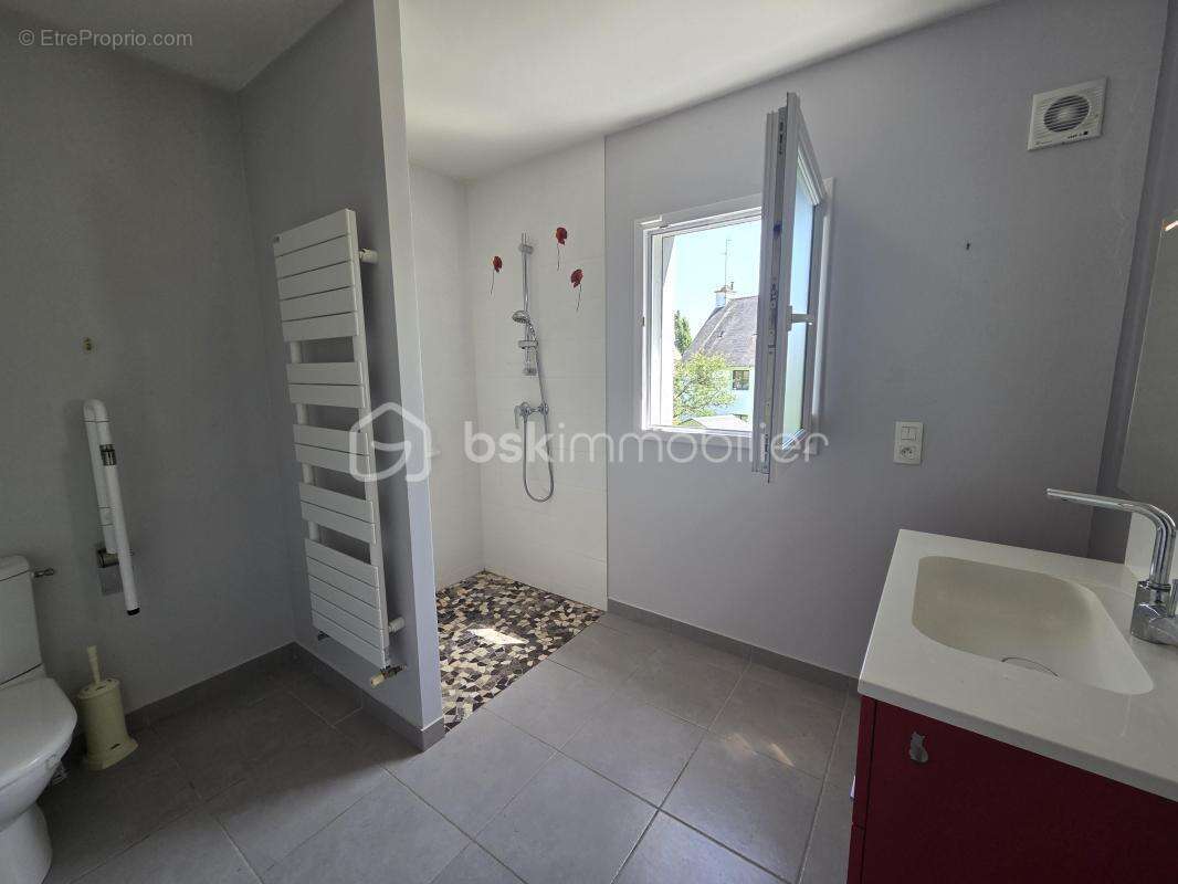 Lorient – Maison familiale de 124,50 m² avec vie de plain-pied, quatre chambres, Garage et Jardin - photo 7