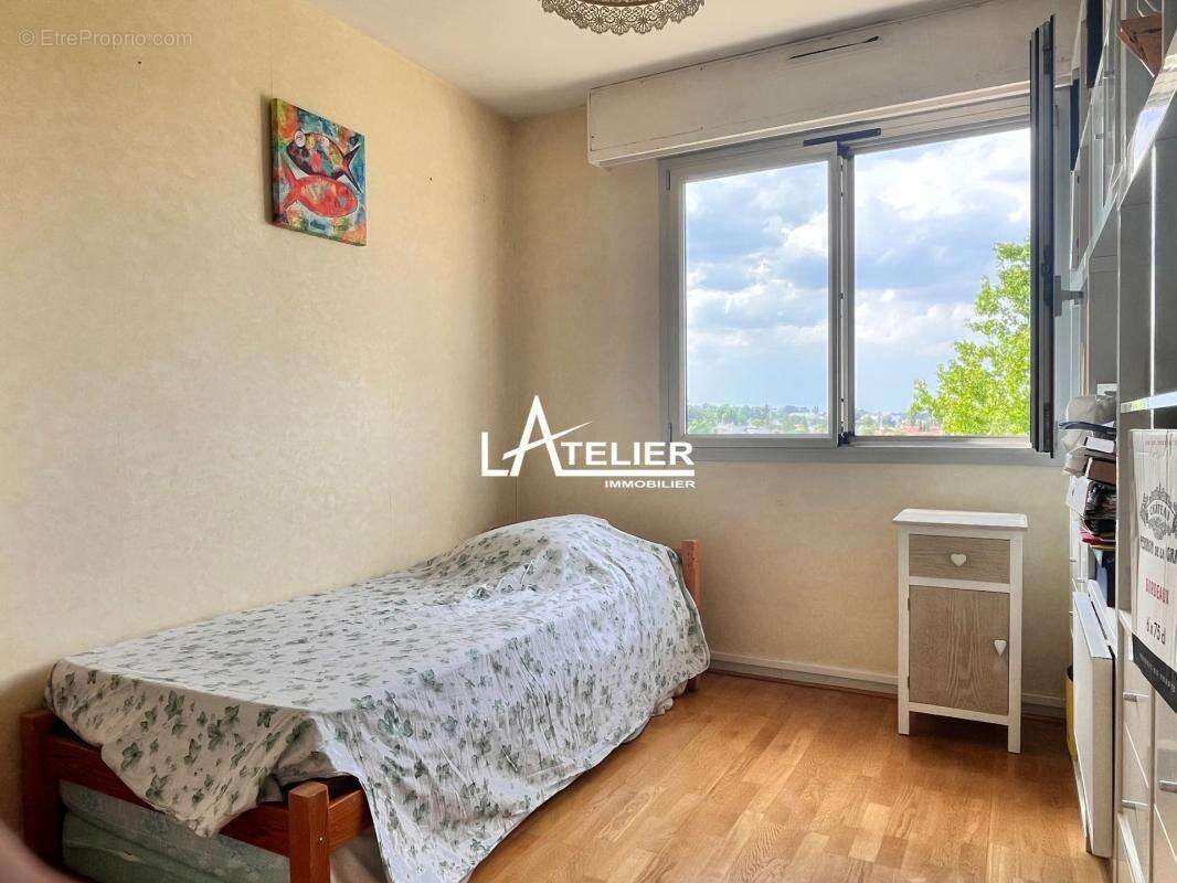T3 81m2 ascenseur, balcon et vue dégagée, 2 parking, cave - photo 9