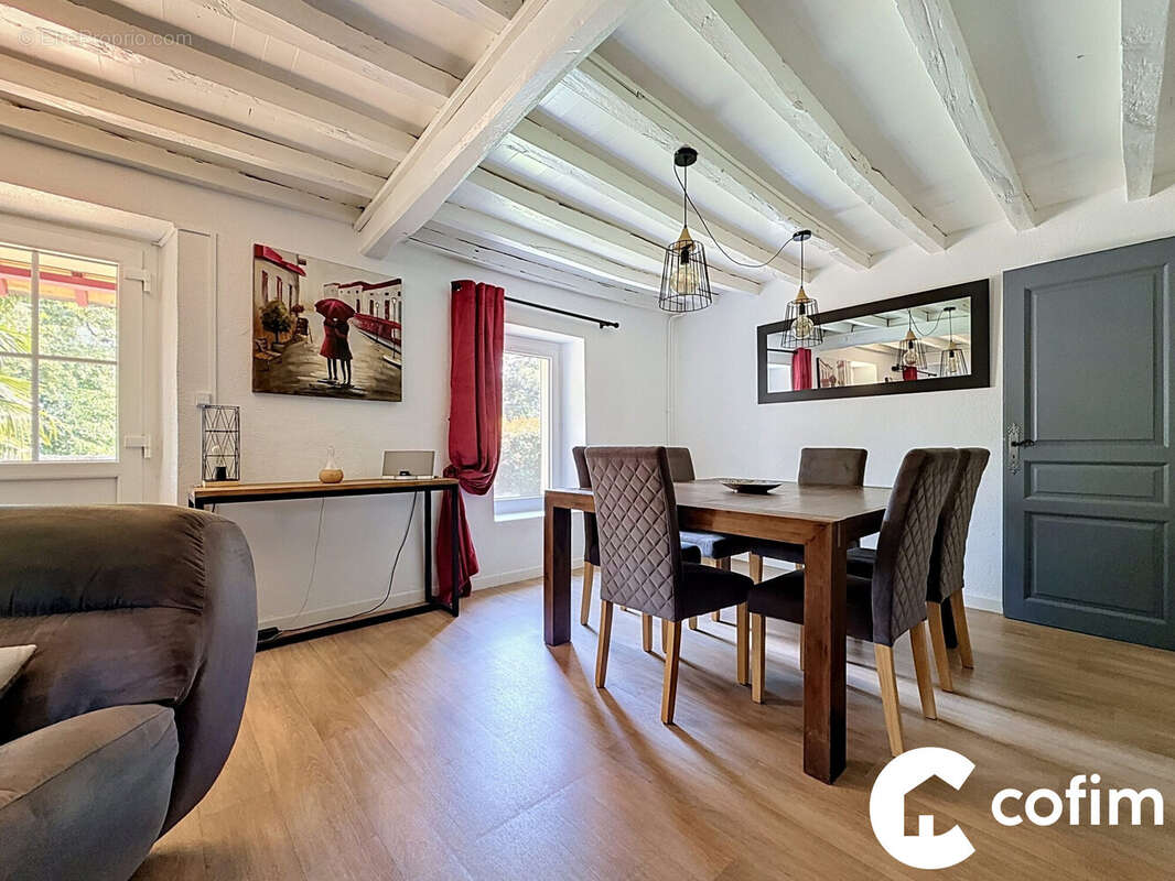 Maison à GAN