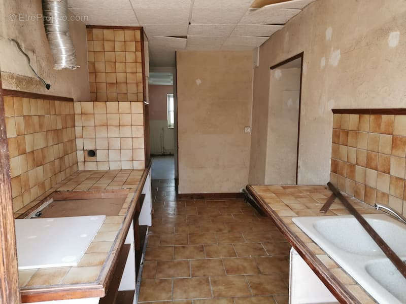 Maison à SAINT-SYMPHORIEN-DE-MARMAGNE