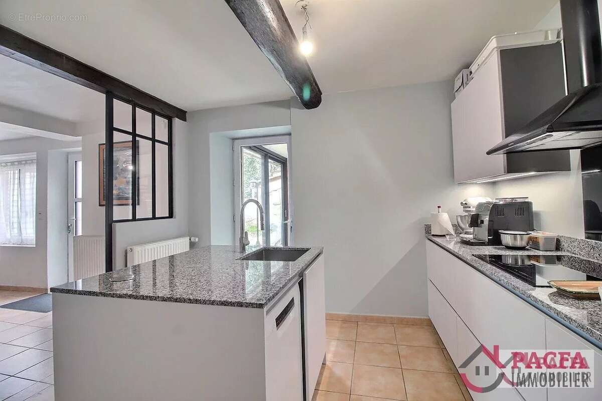 Maison rénovée – Proche centre-ville, confort et garanties décennales - photo 4