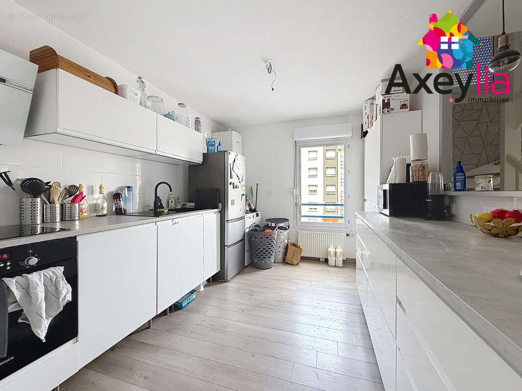 A vendre - roanne - appartement t5, en duplex avec 4 chambres, stationnement, cave et terrasse - photo 3