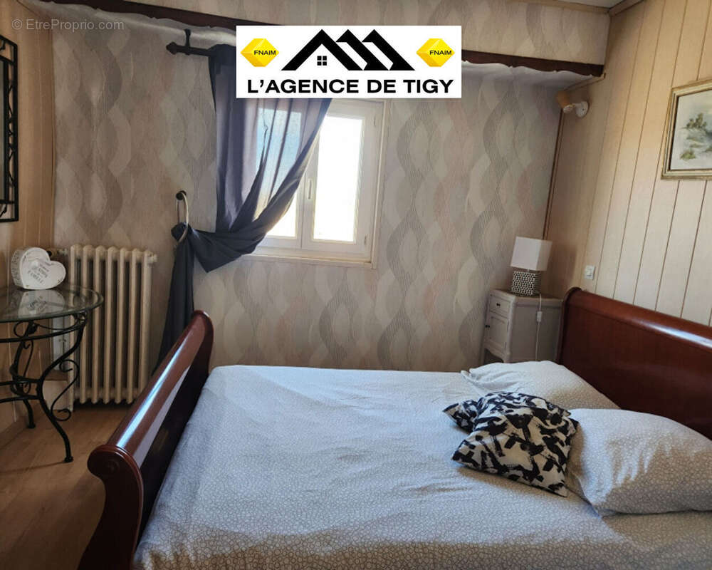 A vendre une charmante maison - photo 5