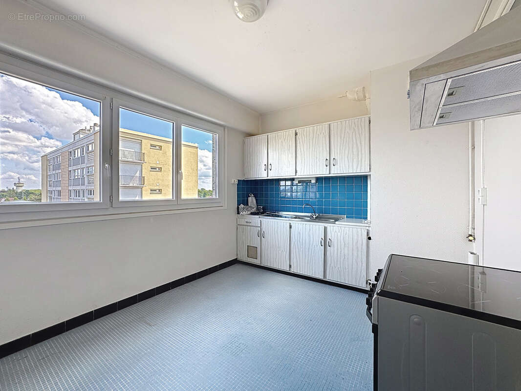 Appartement 2 pièces 57m2 dernier étage avec ascenseur cave et place de parking privative 59300 VALENCIENNES - photo 7
