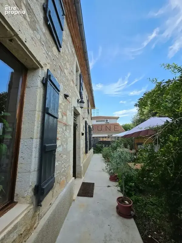 Boé centre ville, maison en pierres de 280m2 avec garage et jardin - photo 17