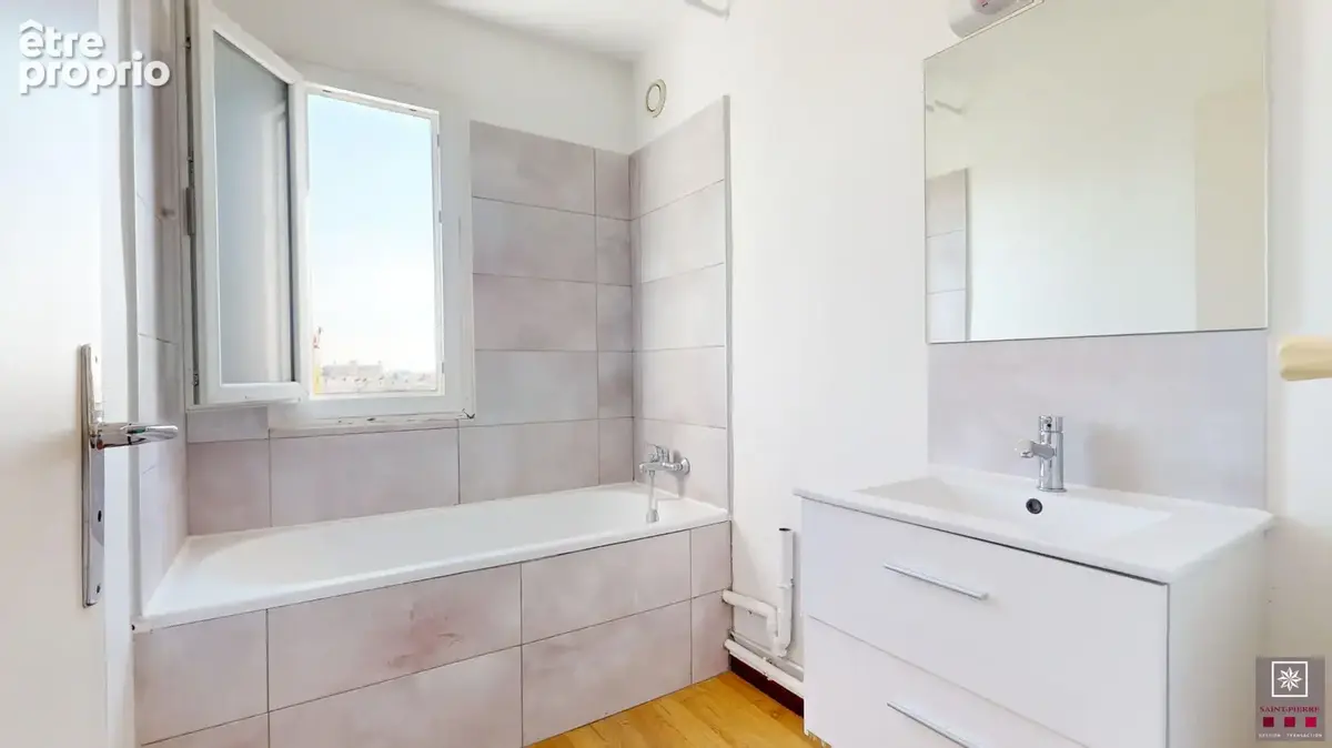 DERNIER ETAGE - T2 avec vue panoramique, cave et parking en s-sol - photo 6