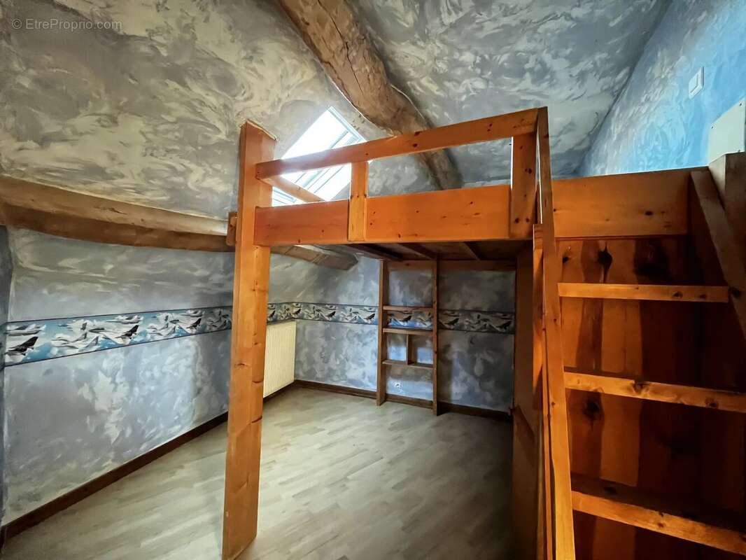 Maison en pierre 8 pièces 165 m² + jardin - photo 10