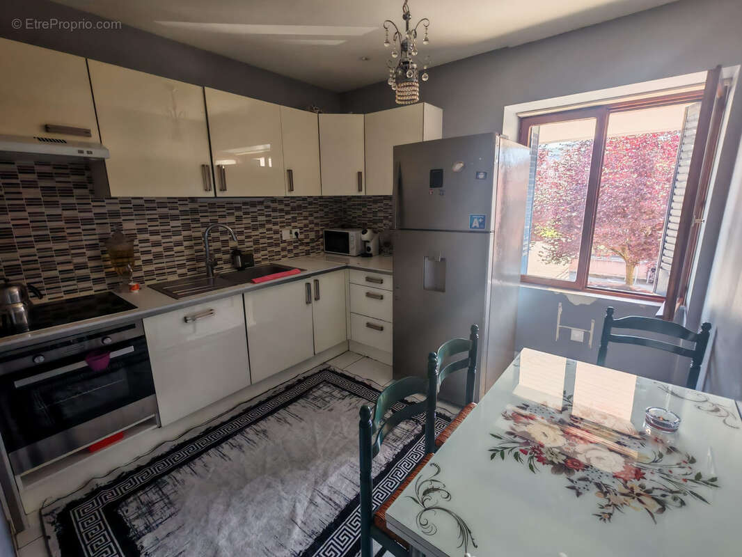 Appartement duplex avec place de stationnement privative et terrasse - photo 2