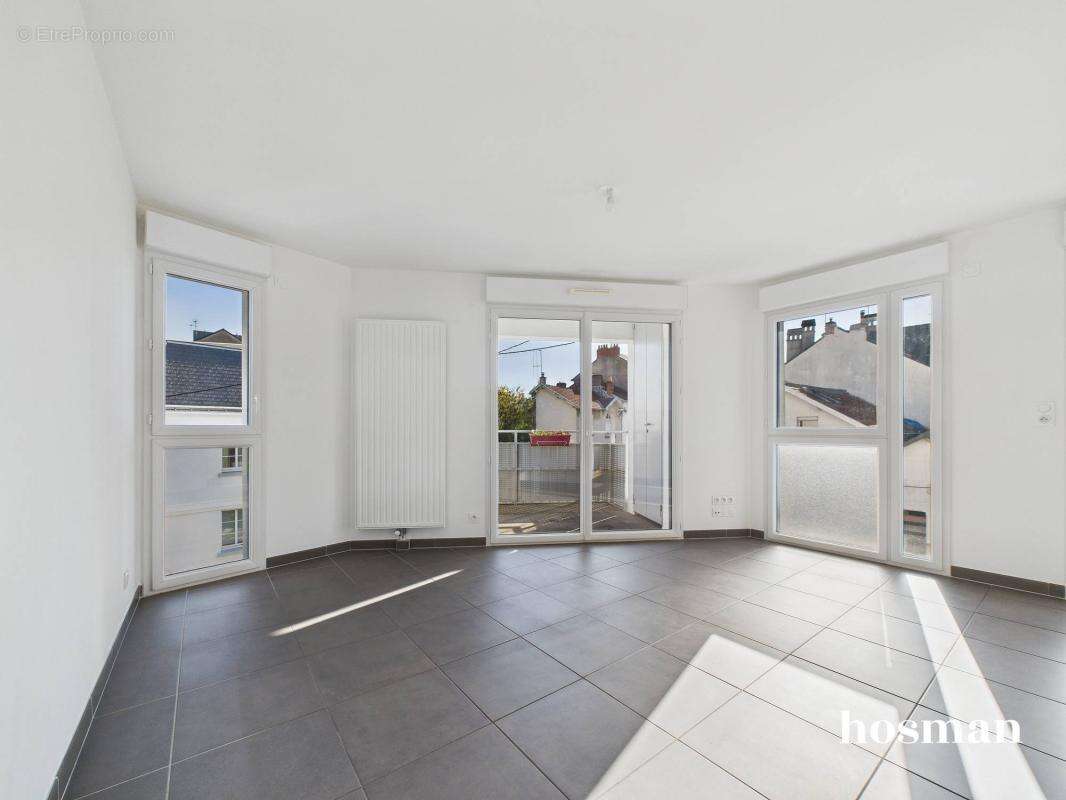 Appartement récent de 3 pièces lumineux avec terrasse et parking - Secteur Hauts-Pavés à Nantes - photo 2