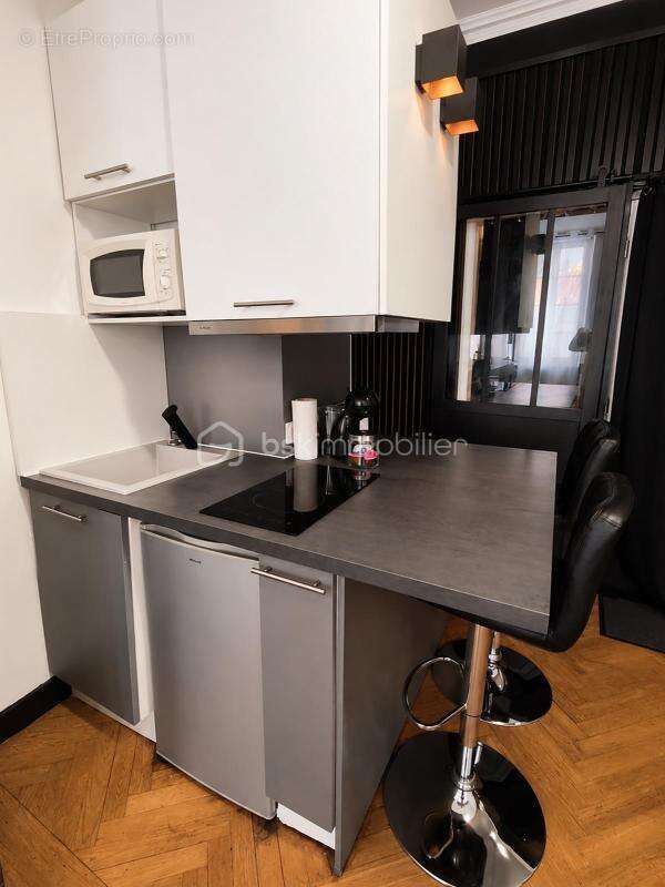 Investissement locatif- un local commercial- 2 appartements- 1 studio - 1 cave- entièrement meublé - photo 14