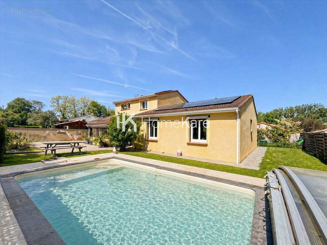 Maison à BEAUZELLE