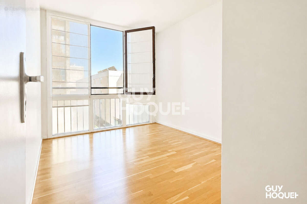 Appartement traversant de 85 m² + balcon - photo 11