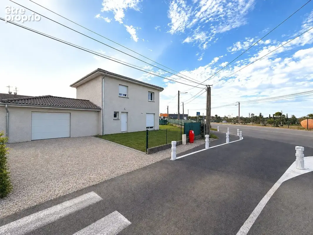Maison 5 pièces 105 m² à vendre à Tignieu-Jameyzieu (38230) - photo 1