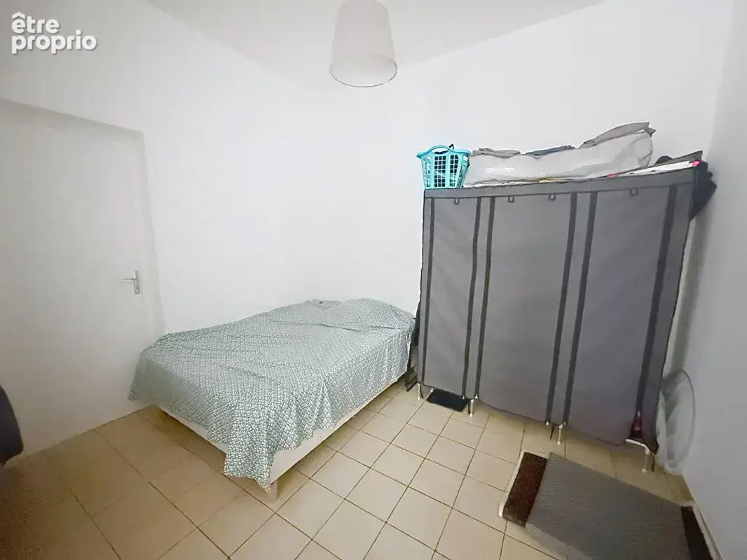 30000  NIMES - studio 36 m2 climatisé au RDC - Vendu Loué - - photo 5