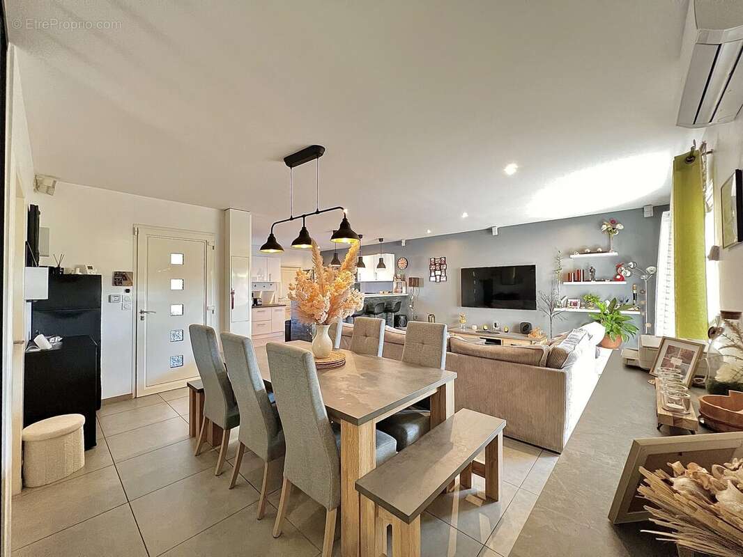 Maison 111 m² à Tignieu-Jameyzieu  - photo 4