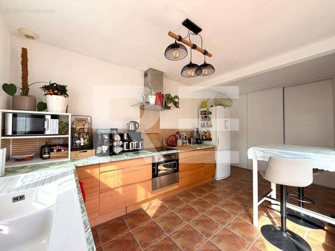 Maison plain-pied 4 chambres, avec garage et jardin à Saint Mamert Du Gard - photo 4