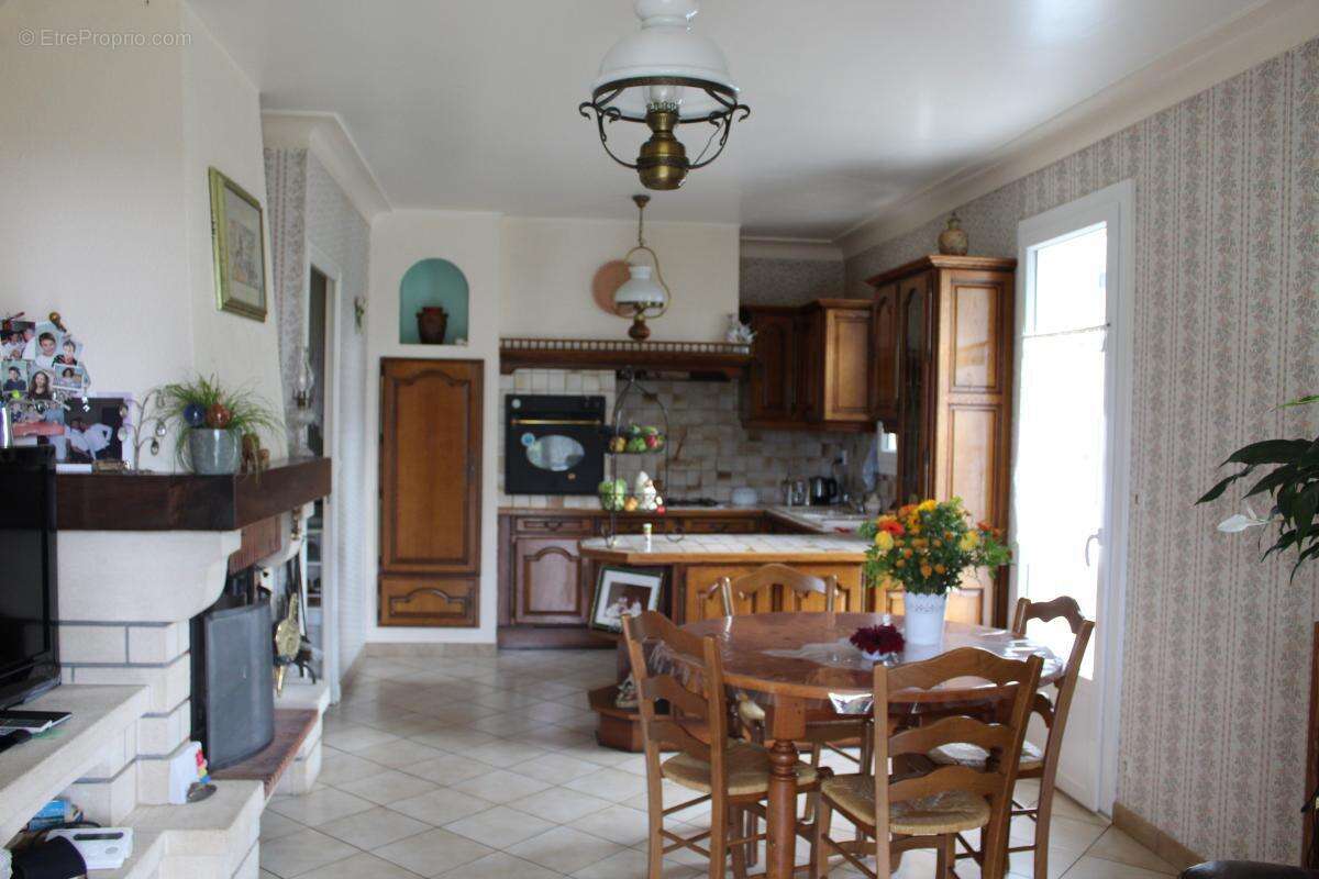 Maison sur deux niveaux avec sous sol - photo 9