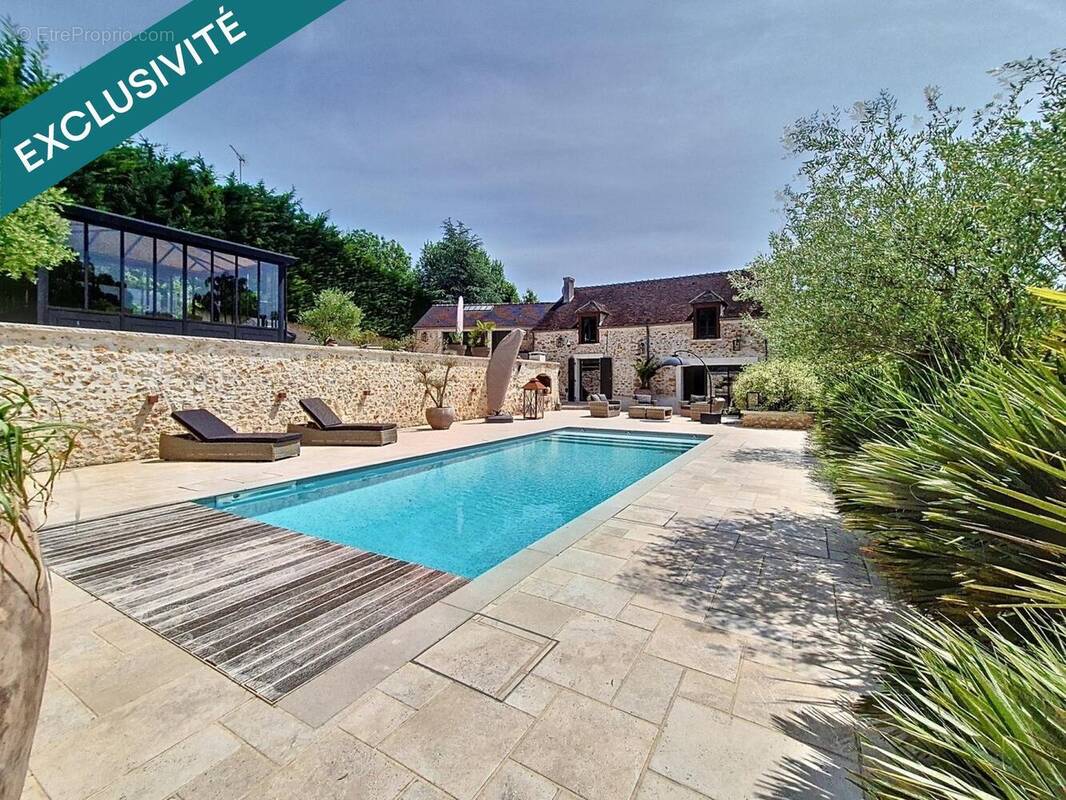 Photo 1 - Maison à BRIE-COMTE-ROBERT