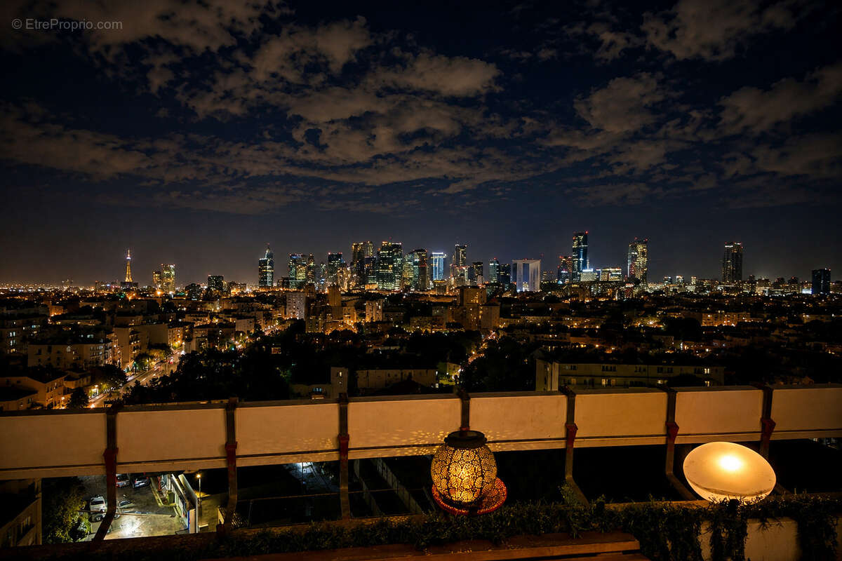 Appartement F3 en dernier étage avec vue dégagée sur Paris et la Défense - photo 7