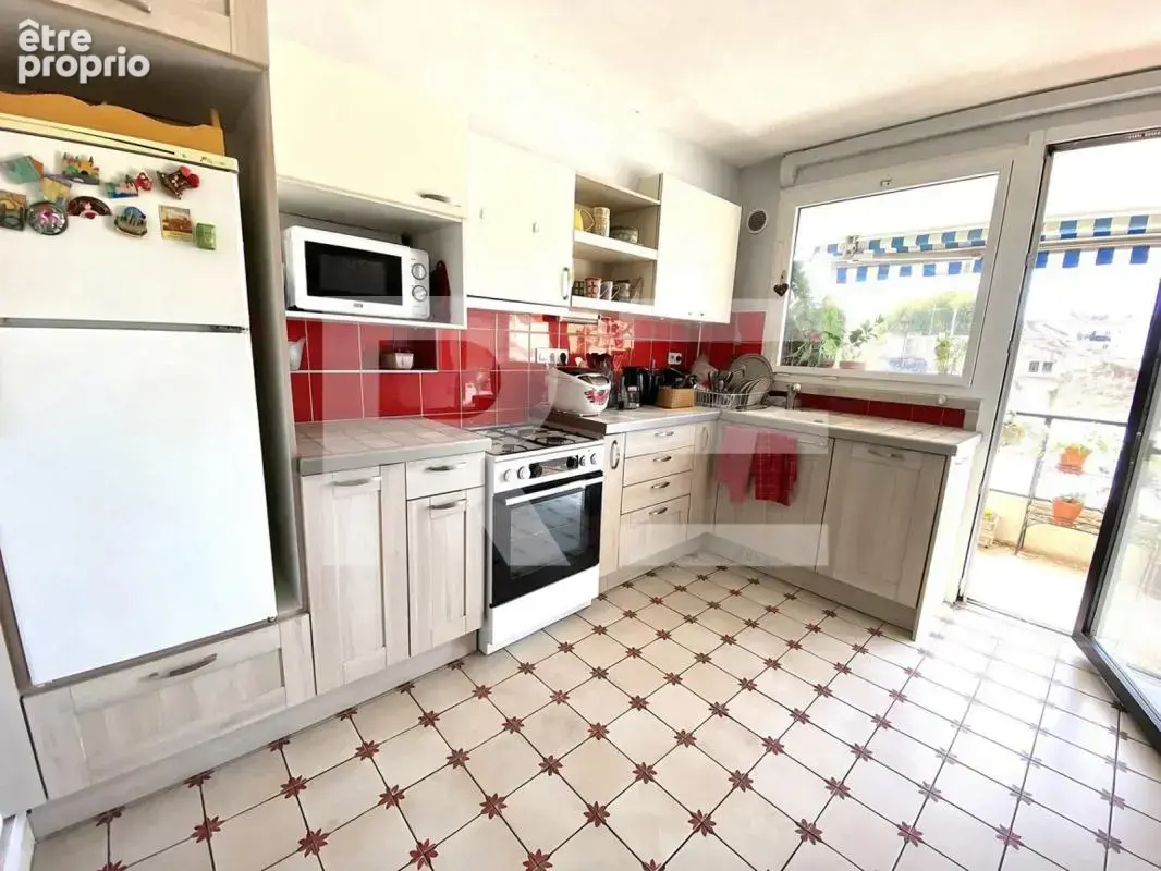 NÎMES CENTRE–APPT de 89 m²–Balcon plein sud, et parking - photo 5