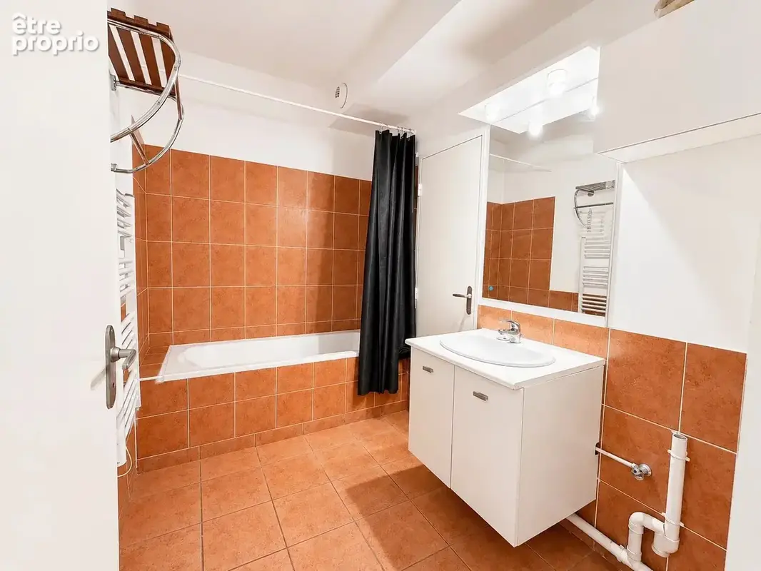 Appartement F3 de 62 m² avec jardin privatif et place de parking sécurisée - photo 5