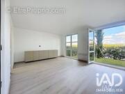 Photo 1 - Appartement à VOISINS-LE-BRETONNEUX