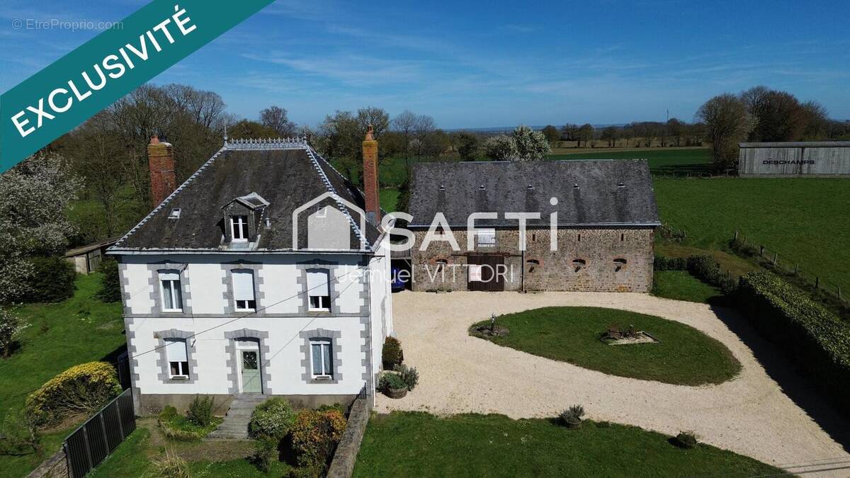 Photo 1 - Maison à SAINT-DENIS-DE-GASTINES