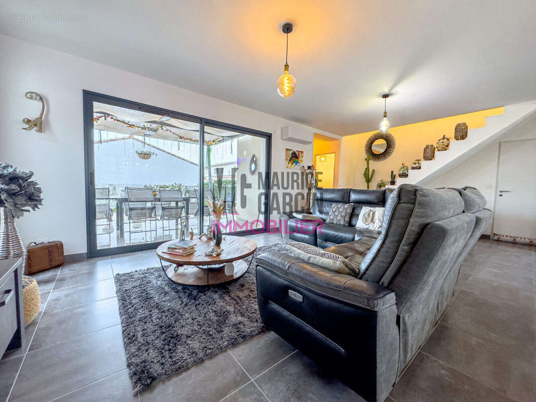 Maison à LAUDUN-L'ARDOISE