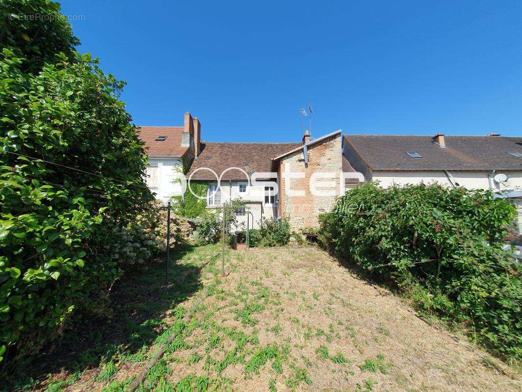 Immeuble de rapport à rénover avec potentiel, en cœur de ville - photo 4