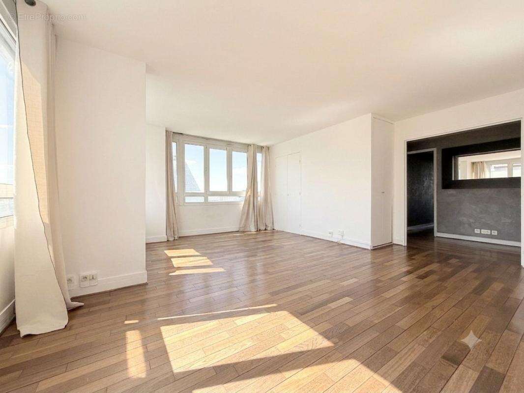 3 pièces limite Paris 15e ! - photo 2