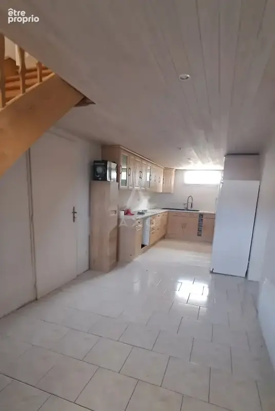 Maison de plain pied avec sous sol semi enterré - photo 15